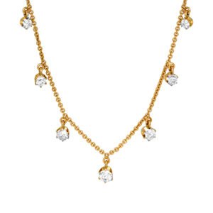 yellow gold necklace set with round diamonds