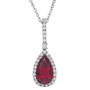 white gold halo drop pendant centered with a pear ruby surrounded by diamonds