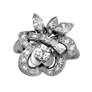 white gold scalloped ring set with a variety of diamond cuts