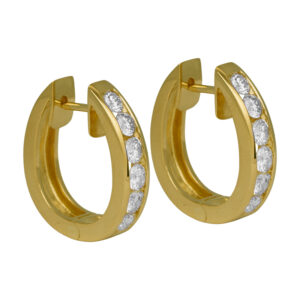 yellow gold huggie hoop earrings set with diamonds