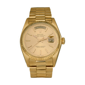 yellow gold rolex watch with a champagne dial