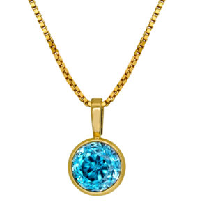 yellow gold solitaire pendant set with a round blue zircon