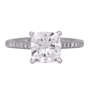 white gold under halo engagement ring centered with a cushion diamond and round diamonds in the under halo and band