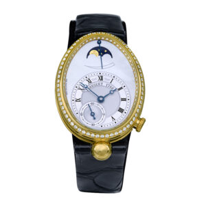 yellow gold watch with a white dial and black leather strap