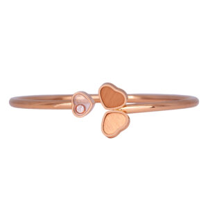 rose gold bangle with hearts and a small round brilliant diamond