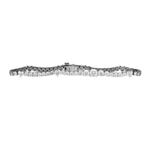 white gold tennis bracelet set with round and heart diamonds