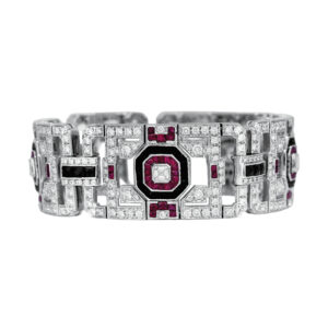 white gold open link bracelet set with diamonds, rubies, and onyx