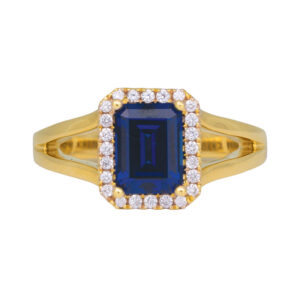 yellow gold halo ring centered with an emerald cut blue sapphire surrounded by a halo of round diamonds
