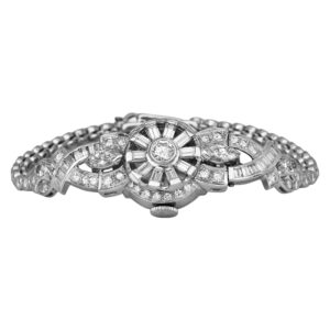 platinum Omega watch with multiple cuts of diamonds