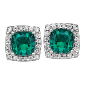 white gold halo earrings set with cushion emeralds surrounded by round diamonds