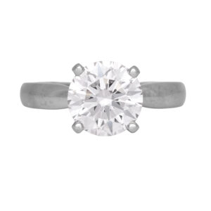 white gold solitaire engagement ring centered with a round brilliant diamond