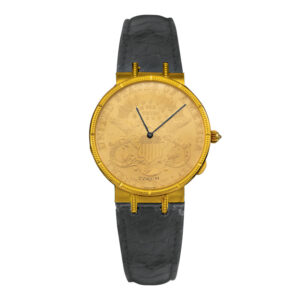 yellow gold coin watch with a black leather strap