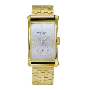 yellow gold Patek Phillipe with a silver dial