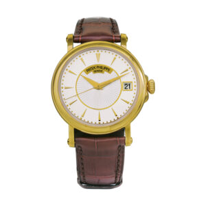 yellow gold watch with a silver dial and brown leather strap