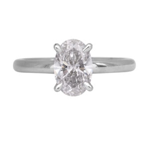 white gold solitaire engagement ring set with an oval diamond
