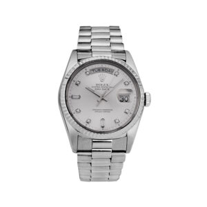white gold Rolex with a silver diamond dial