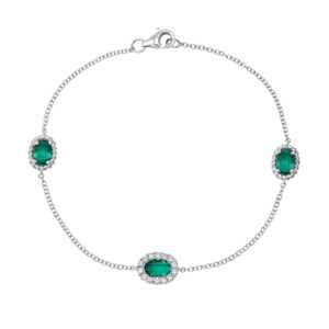 white gold link bracelet set with oval checkerboard emeralds surrounded by round diamonds