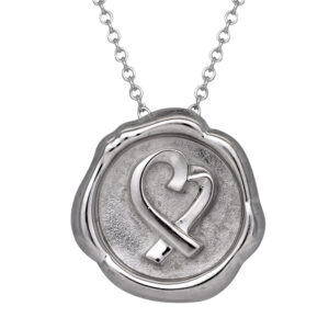 sterling silver wax seal with a ribbon heart impression