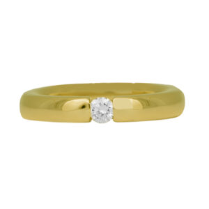 yellow gold tension band set with a round diamond