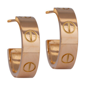 yellow gold Cartier LOVE huggie hoop earrings