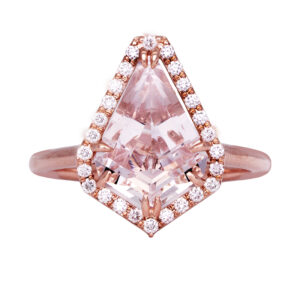 rose gold halo ring centered with a kite shaped morganite surrounded by round diamonds
