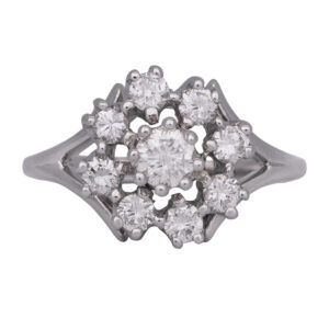 white gold halo style ring set with round brilliant diamonds