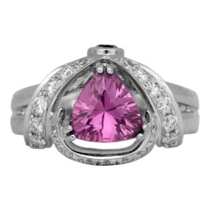 white gold Judy Mayfield ring with a trillion and round brilliant pink sapphire and round diamonds