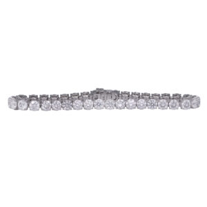 white gold tennis bracelet set with round diamonds
