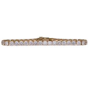yellow gold tennis bracelet set with round diamonds