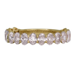yellow gold band set with oval diamonds