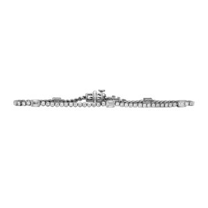 white gold tennis bracelet set with round and emerald diamonds
