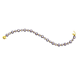 yellow gold and black rhodium tennis bracelet set with round diamonds