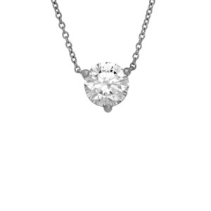 white gold solitaire station pendant set with a round diamond