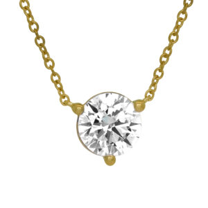 yellow gold solitaire station pendant set with a round diamond