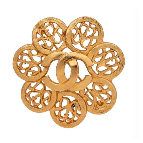 Chanel gold tone flower brooch