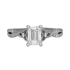 white gold platinum braided engagement ring centered with an emerald cut diamond flanked by two triquetra knots