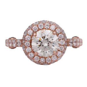 rose gold halo engagement centered with a round diamond surrounded by round diamonds in the halo and band