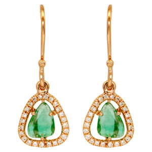 yellow gold halo drop earrings set with freeform emeralds surrounded by round diamond haloes