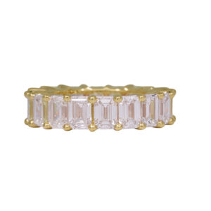 yellow gold eternity band set with emerald cut diamonds