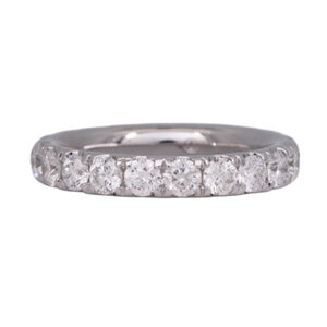 white gold band set with round diamonds