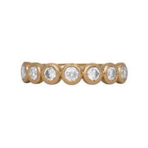 yellow gold band set with round diamonds