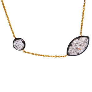 yellow gold necklace set with offset round and marquise diamonds