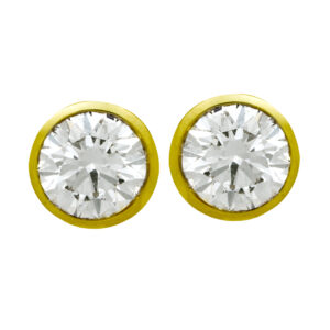 yellow gold stud earrings bezel set with round diamonds