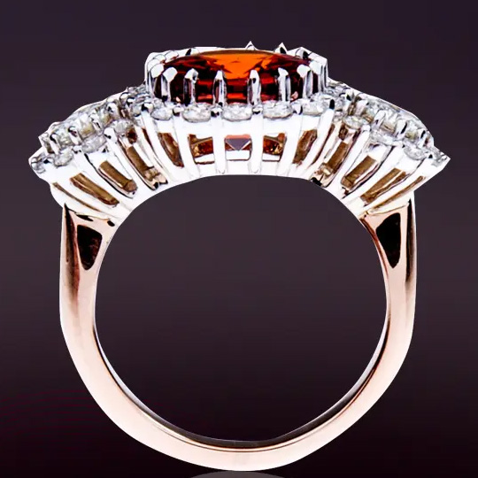 a custom gemstone and diamond ring crafted by Leo Hamel Fine Jewelers