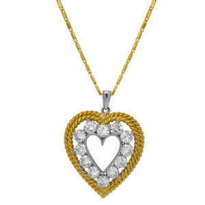 Vintage 18k yellow and white gold braided open heart pendant set with 1.80 carats of round brilliant cut earth-mined diamonds.