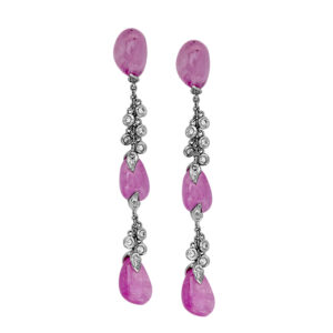 Vintage 18k white gold dangle earrings set with 27.96 carats of cabochon pink sapphires plus 0.42 carats of round brilliant earth-mined diamonds.