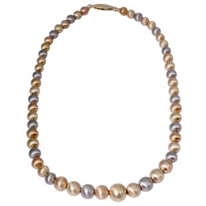 Vintage 18k yellow, white, and rose gold necklace with graduated textured beads.