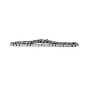 Vintage 14k white gold tennis bracelet set with 4.48 carats of 64 round brilliant earth-mined diamonds.
