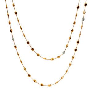 Vintage 18k yellow gold Marco Bicego Siviglia bean necklace set with 1.50 carats of round brilliant earth-mined diamonds on a 54.5" chain.