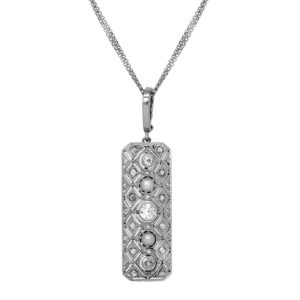 Antique 14k white gold lattice pendant set with 0.52 carats of old European cut diamonds plus 0.15 carats of rose cut diamonds plus two pearls.